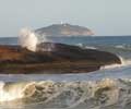 This is a view of Arpoador, where surfing was born in Rio.