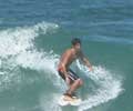 Surfing in Ipanema. Photo by Silviano courtesy of www.ipanema.com.