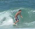 Surfing in Ipanema. Photo by Silviano courtesy of www.ipanema.com.