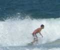 Surfing in Ipanema. Photo by Silviano courtesy of www.ipanema.com.