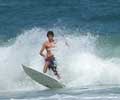 Surfing in Ipanema. Photo by Silviano courtesy of www.ipanema.com.