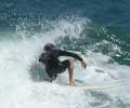 Surfing in Ipanema. Photo by Silviano courtesy of www.ipanema.com.