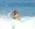 Surfing in Ipanema. Photo by Silviano courtesy of www.ipanema.com.