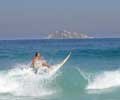 Surfing in Ipanema. Photo by Silviano courtesy of www.ipanema.com.