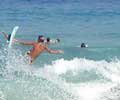 surfing in ipanema